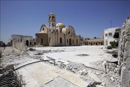 كنيسة مار الياس للروم الأرثوذكس في القصير في ريف حمص امس الاول (ا ف ب) 